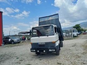 Nissan L80.14 Самосвал, снимка 2