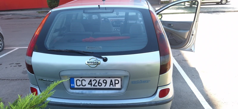 Nissan Almera tino, снимка 11 - Автомобили и джипове - 47310516