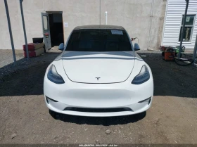 Tesla Model Y 020 TESLA MODEL Y LONG RANGE DUAL MOTOR ALL-WHEEL  - 16000 € / 31293.28 лв. - 49796740 2