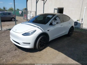 Tesla Model Y 020 TESLA MODEL Y LONG RANGE DUAL MOTOR ALL-WHEEL  - 16000 € / 31293.28 лв. - 49796740 3