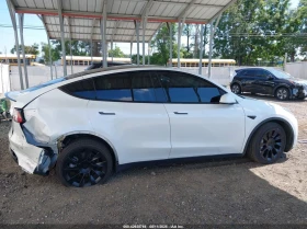 Tesla Model Y 020 TESLA MODEL Y LONG RANGE DUAL MOTOR ALL-WHEEL  - 16000 € / 31293.28 лв. - 49796740 4
