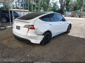 Tesla Model Y 020 TESLA MODEL Y LONG RANGE DUAL MOTOR ALL-WHEEL  - 16000 € / 31293.28 лв. - 49796740 7