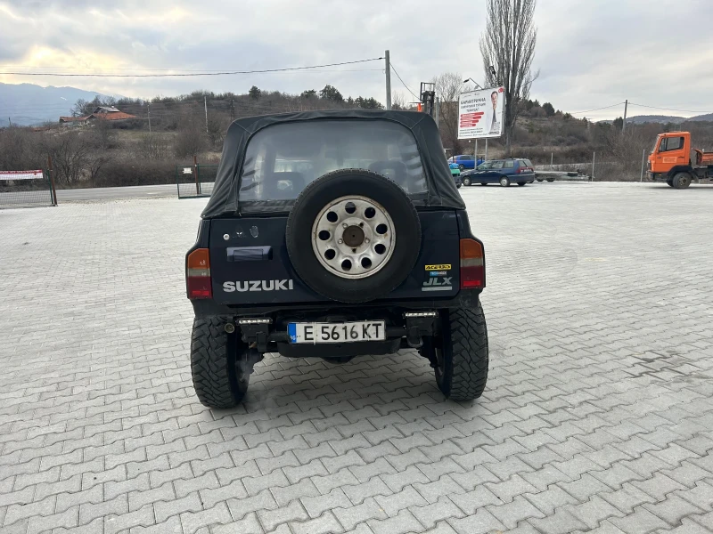 Suzuki Vitara 1.6 Газ, снимка 13 - Автомобили и джипове - 49186598