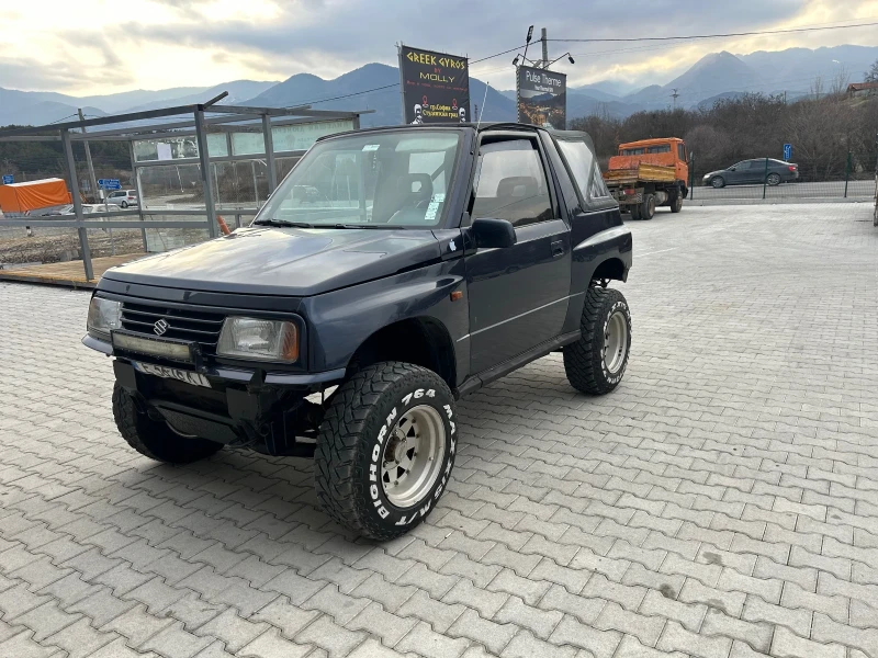 Suzuki Vitara 1.6 Газ, снимка 16 - Автомобили и джипове - 49186598