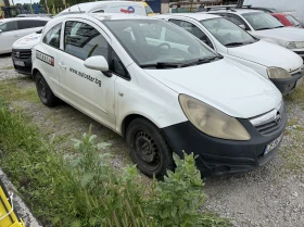 Opel Corsa за ремонт-изхвърля вода, снимка 2
