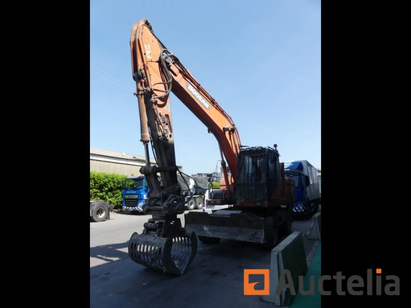 Багер DOOSAN DX210W, снимка 16 - Индустриална техника - 47457401