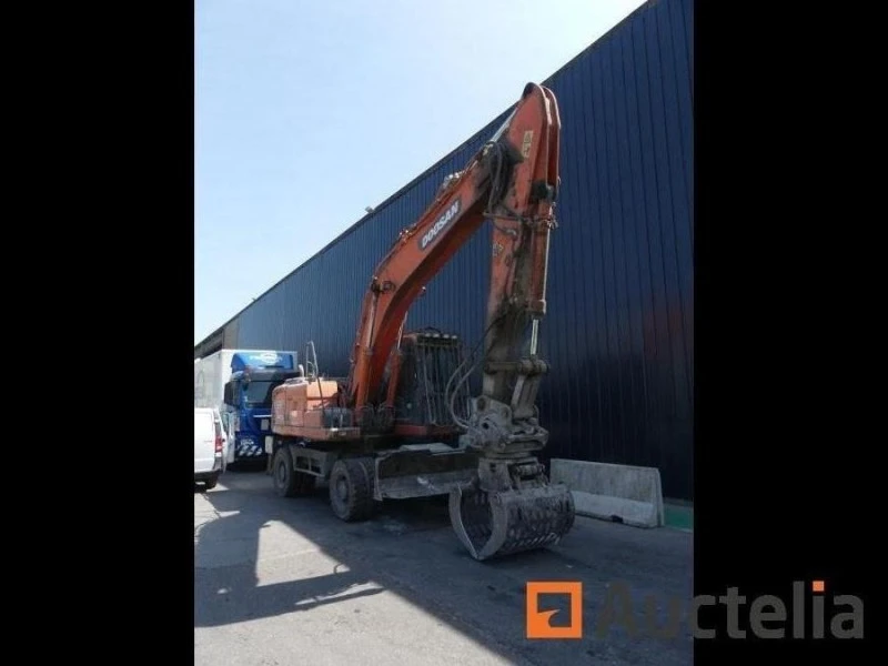 Багер DOOSAN DX210W, снимка 8 - Индустриална техника - 47457401