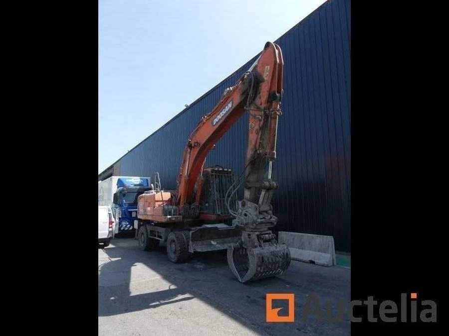 Багер DOOSAN DX210W - изображение 8