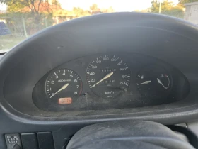 Nissan Micra 1.3, снимка 9