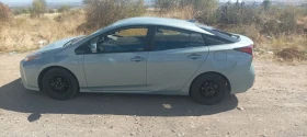 Обява за продажба на Toyota Prius 1.8i хибрид 4x4 ~32 999 лв. - изображение 3
