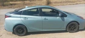 Обява за продажба на Toyota Prius 1.8i хибрид 4x4 ~32 999 лв. - изображение 2