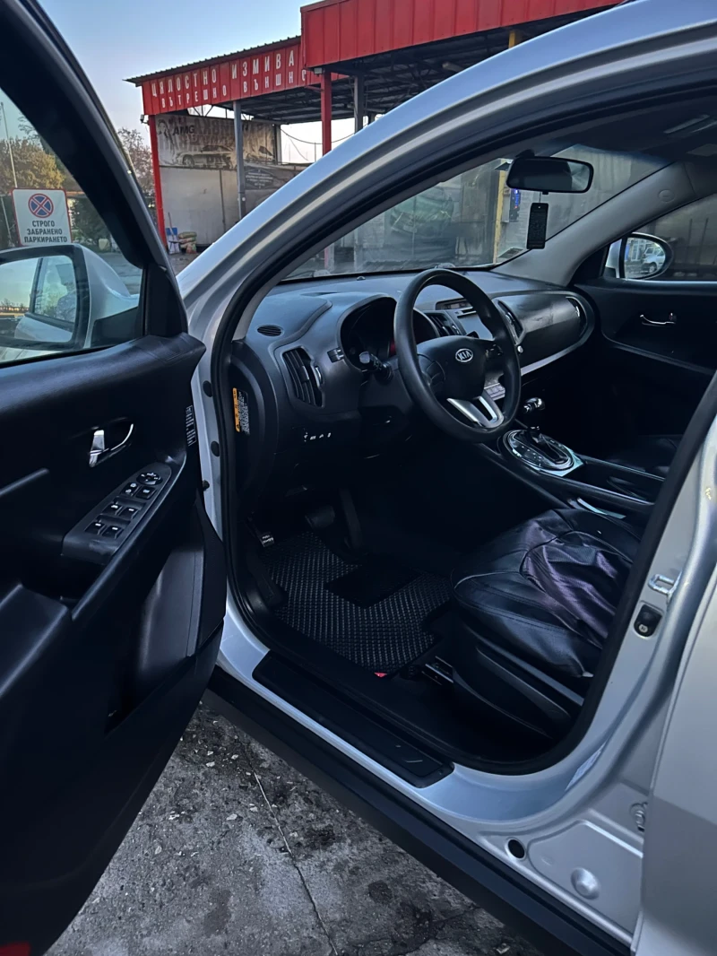 Kia Sportage 2.0  4x4, снимка 9 - Автомобили и джипове - 53154618