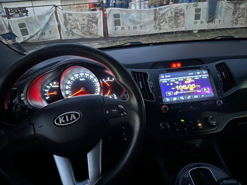 Kia Sportage 2.0  4x4, снимка 11 - Автомобили и джипове - 53154618
