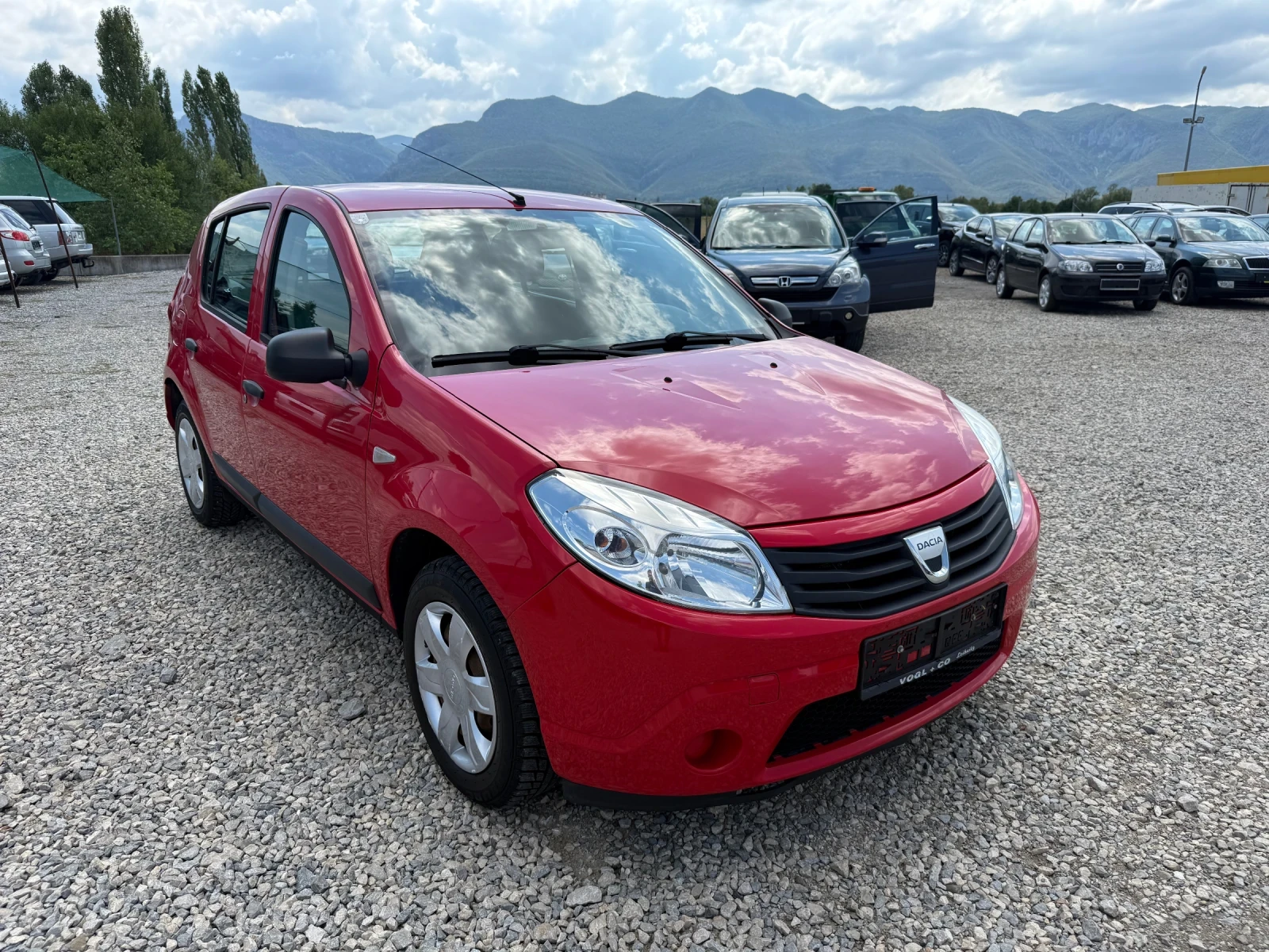 Dacia Sandero 1.2i-75PS-КЛИМАТИК - изображение 3