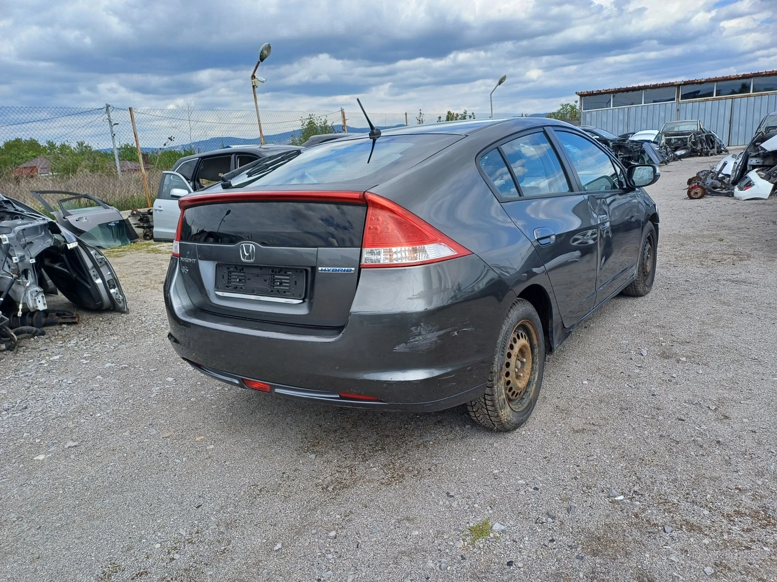 Honda Insight 1.3i-88кс-hibrid - изображение 4