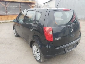 Mitsubishi Colt 1.1i klima 75 - изображение 3