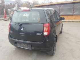 Mitsubishi Colt 1.1i klima 75 - изображение 4