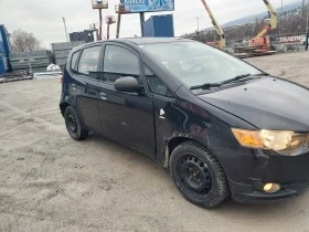 Mitsubishi Colt 1.1i klima 75 - изображение 5