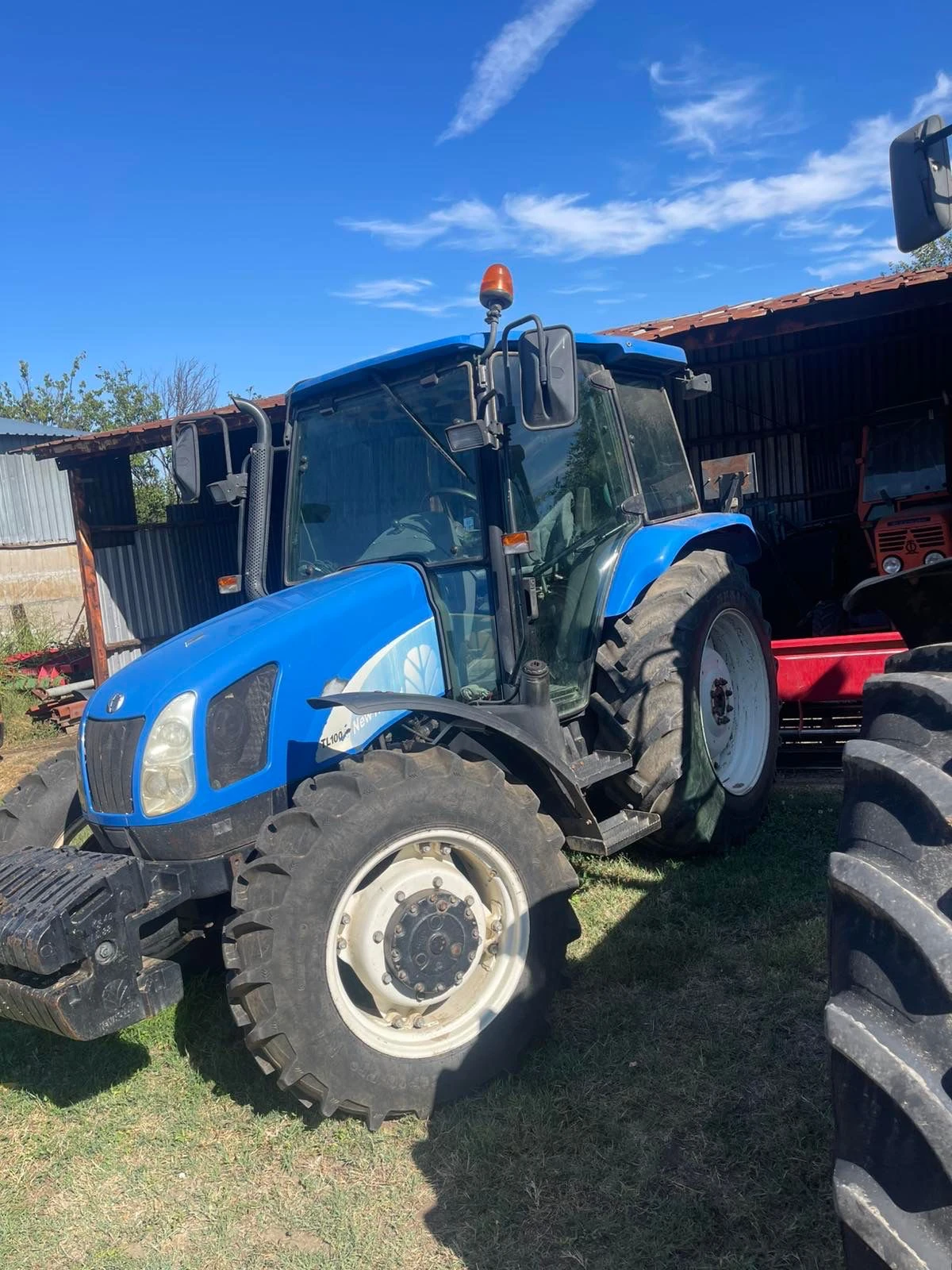 Трактор New Holland TL 100  - изображение 7