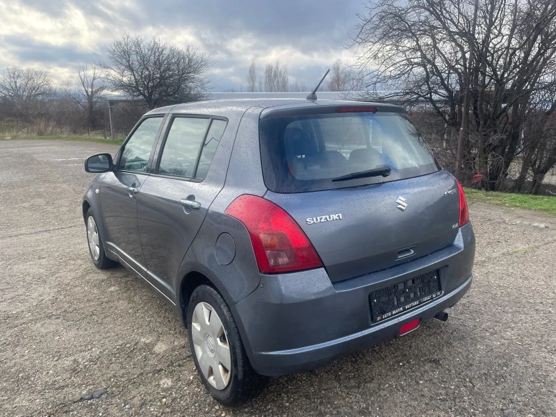 Suzuki Swift 1.3i 4x4 KLIMA, снимка 4 - Автомобили и джипове - 48453044