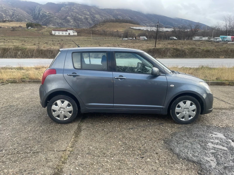 Suzuki Swift 1.3i 4x4 KLIMA, снимка 7 - Автомобили и джипове - 48453044