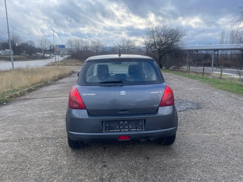 Suzuki Swift 1.3i 4x4 KLIMA, снимка 5 - Автомобили и джипове - 48453044