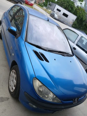������ Peugeot 206