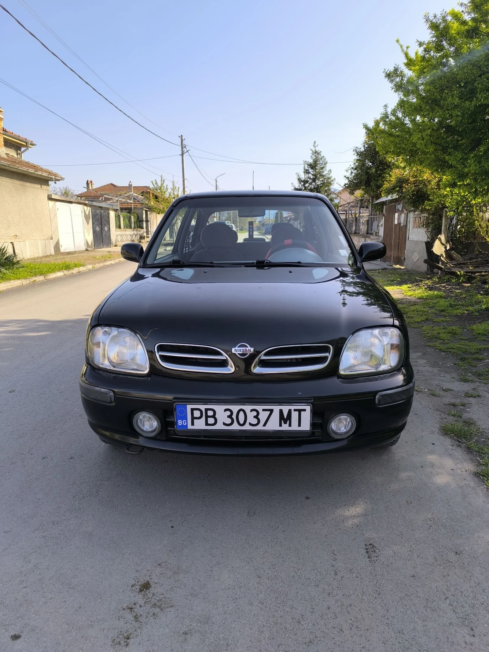 Nissan Micra 1, 3куб. 75к. - изображение 2