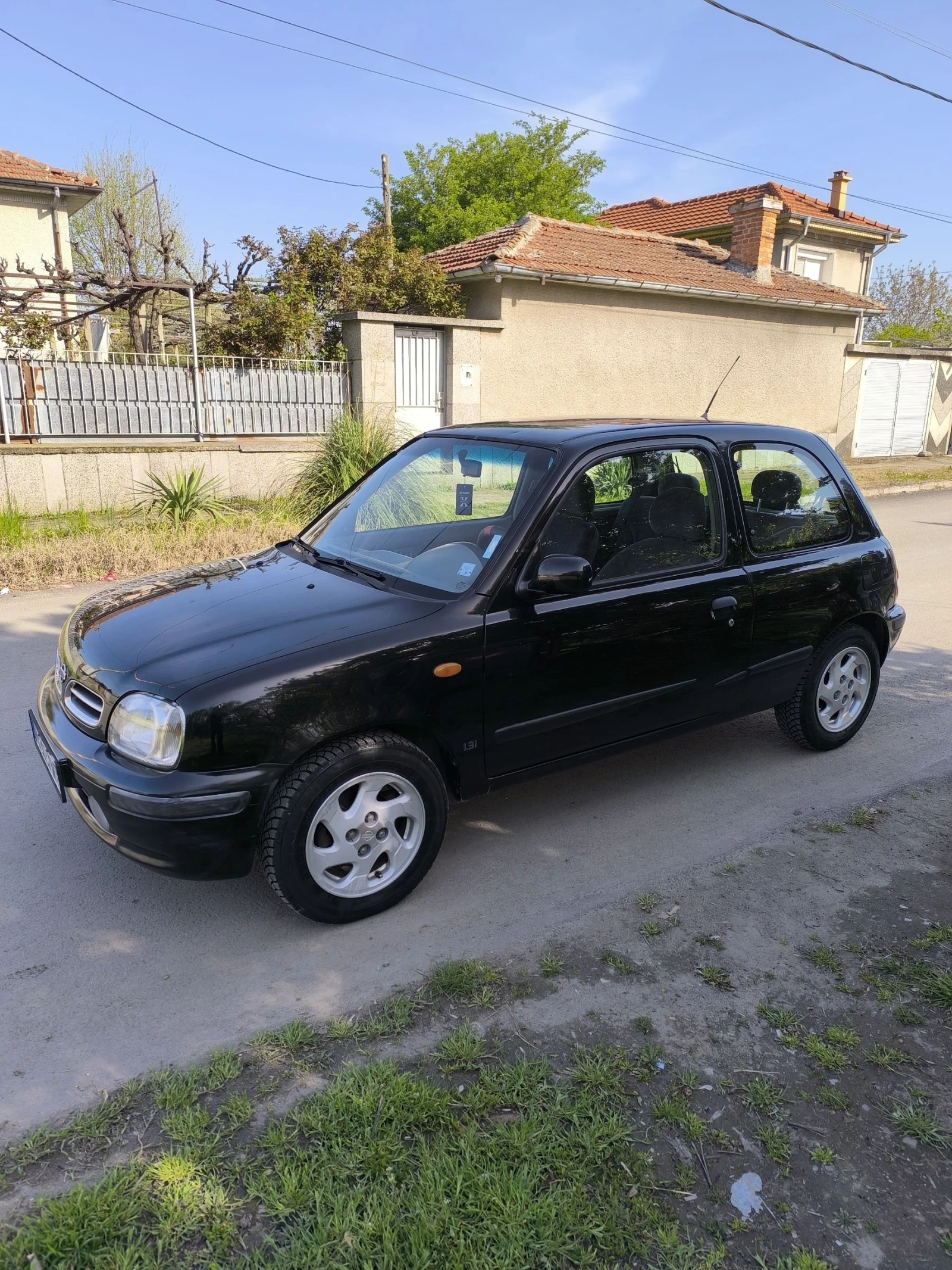 Nissan Micra 1, 3куб. 75к. - изображение 4