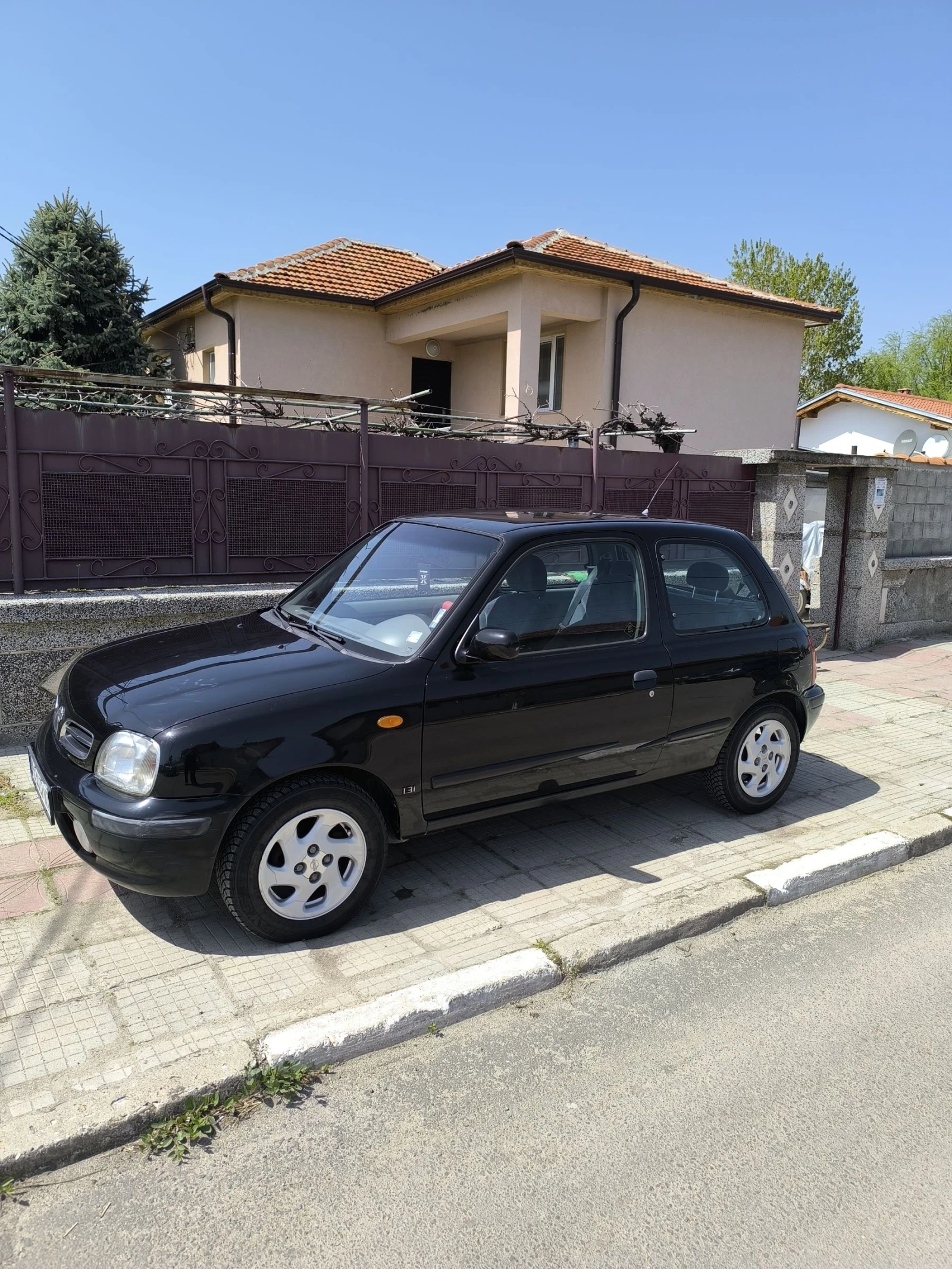 Nissan Micra 1, 3куб. 75к. - изображение 6