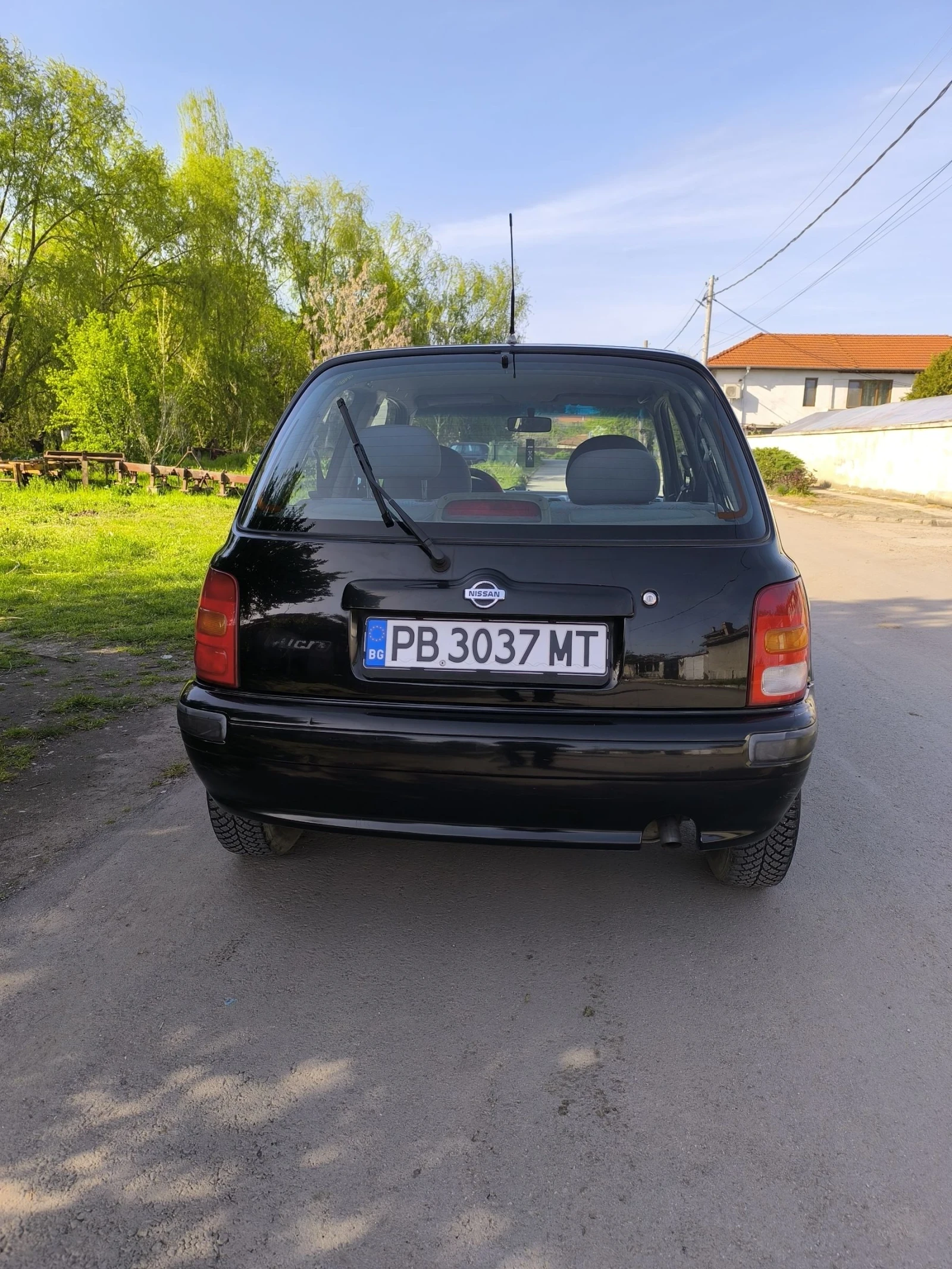 Nissan Micra 1, 3куб. 75к. - изображение 5