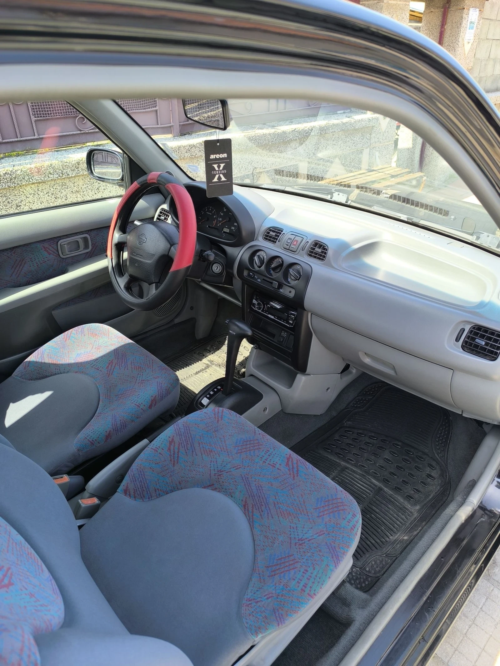 Nissan Micra 1, 3куб. 75к. - изображение 8