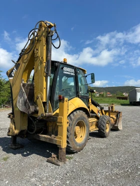 Багер Caterpillar 428 E, снимка 5
