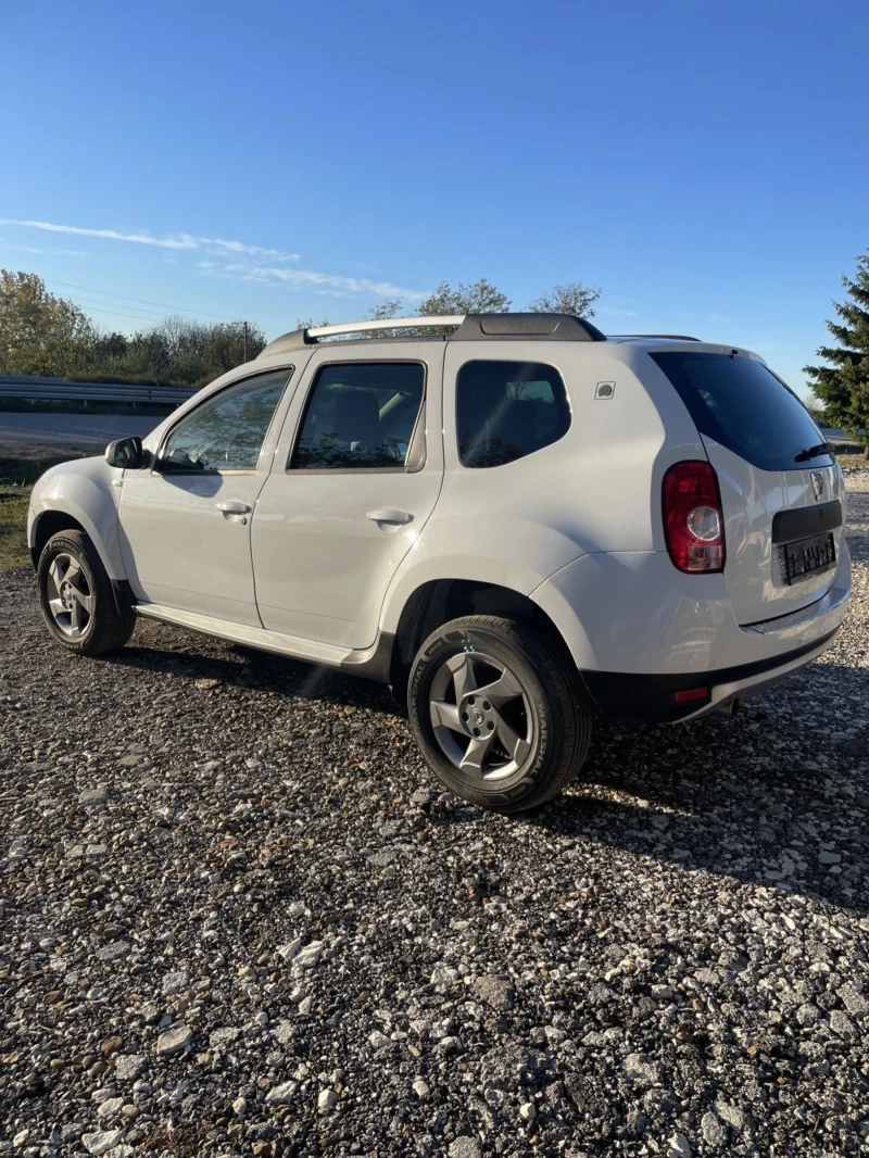 Dacia Duster 1.6i GAZ-BENZIN, снимка 4 - Автомобили и джипове - 52771657