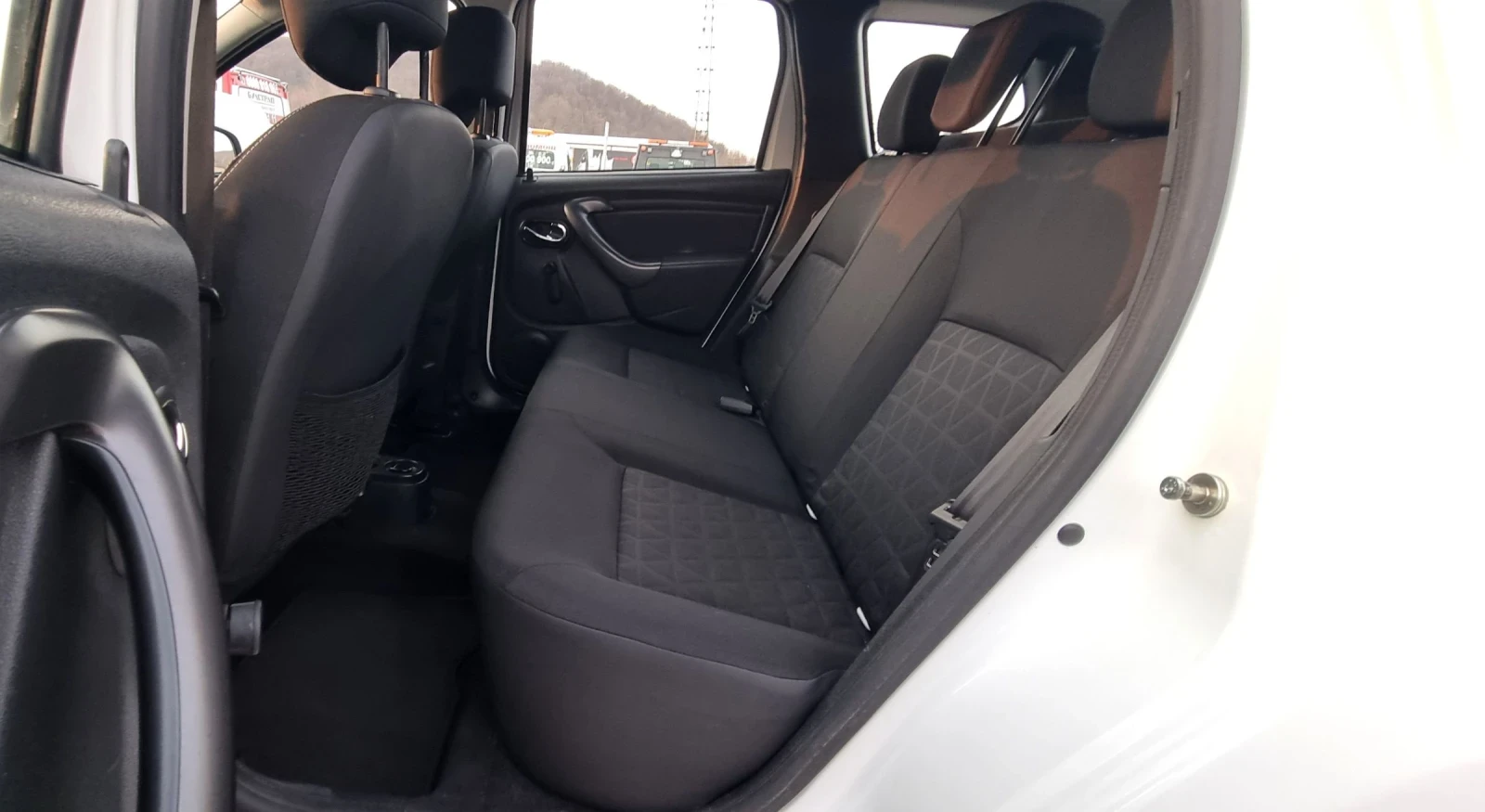 Dacia Duster 1.6i LPG Face, снимка 16 - Автомобили и джипове - 53731527