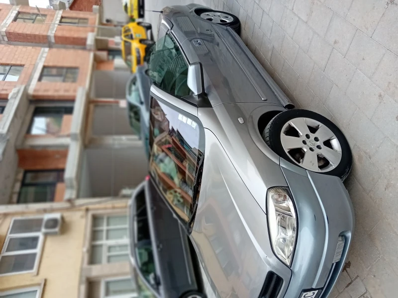 Opel Astra, снимка 1 - Автомобили и джипове - 47078631