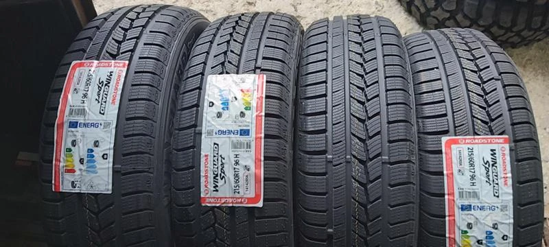 Гуми Зимни 215/60R17, снимка 1 - Гуми и джанти - 34684092