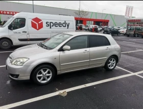     Toyota Corolla 1.6  /   