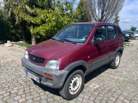 Daihatsu Terios 1.3i 4x4, снимка 1