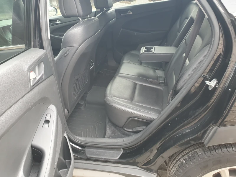 Hyundai Tucson 2.0i 4x4, снимка 11 - Автомобили и джипове - 53380411