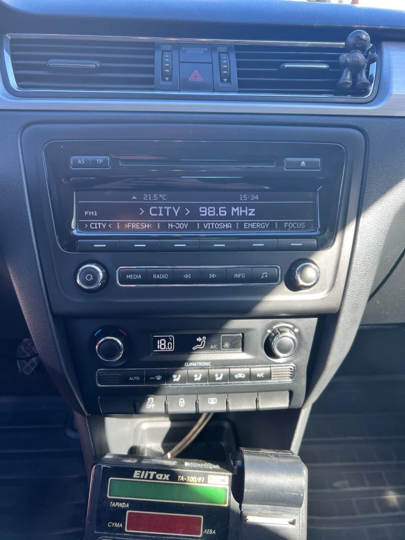 Skoda Rapid 1.2i LPG, снимка 10 - Автомобили и джипове - 52817586