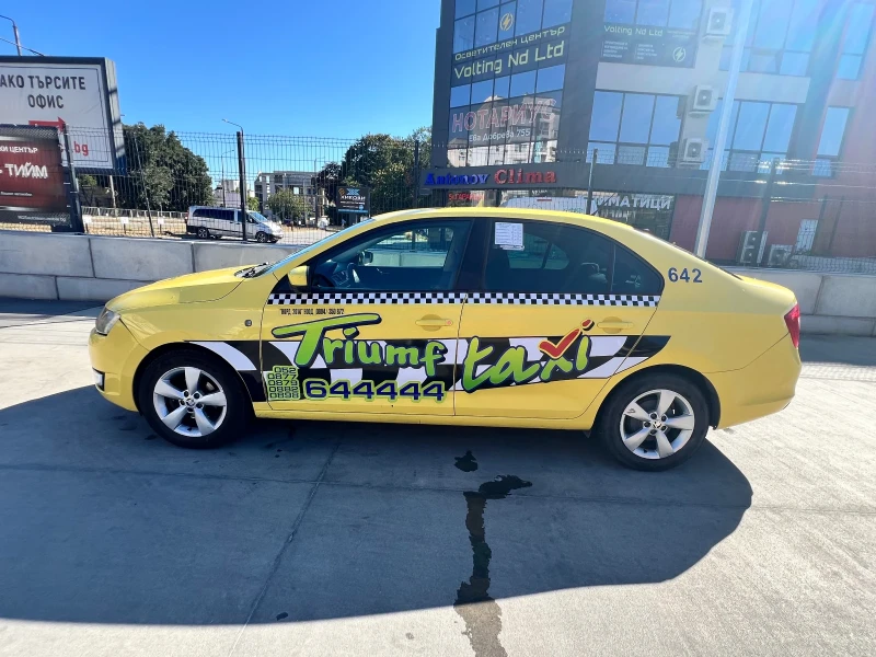 Skoda Rapid 1.2i LPG, снимка 6 - Автомобили и джипове - 52817586