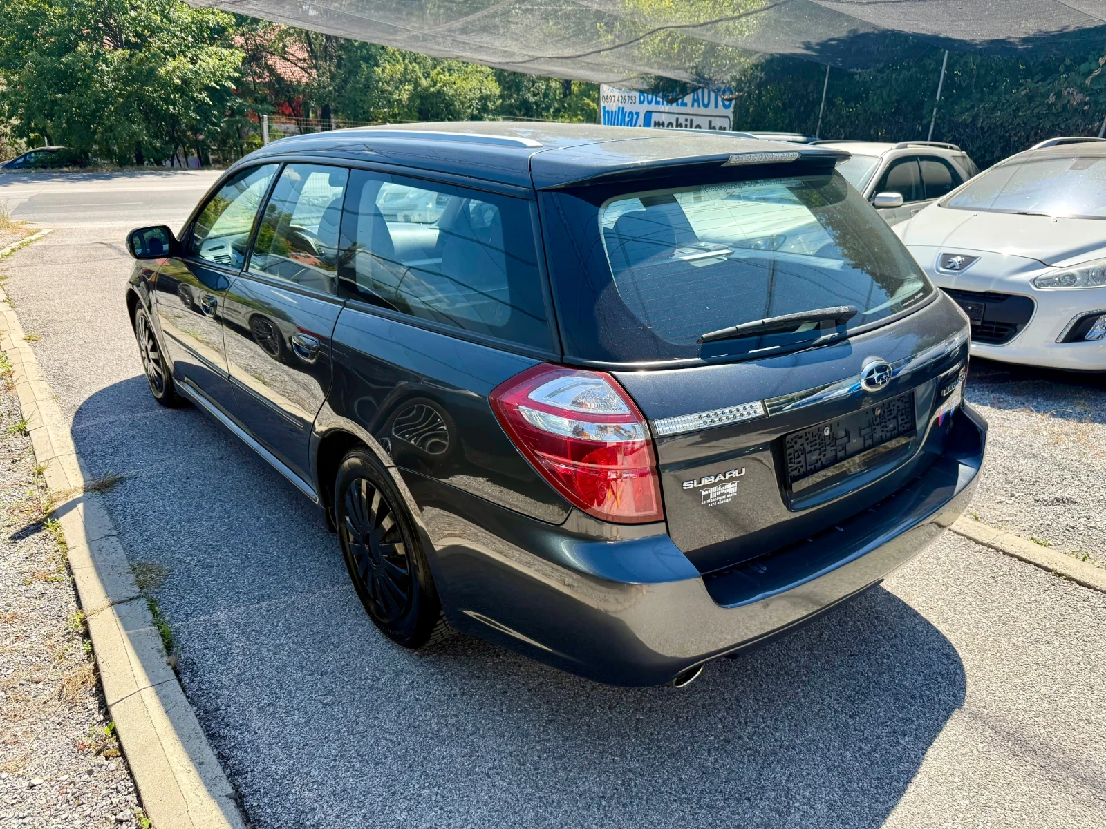 Subaru Legacy 2.0R AWD🇨🇭, снимка 4 - Автомобили и джипове - 55937643