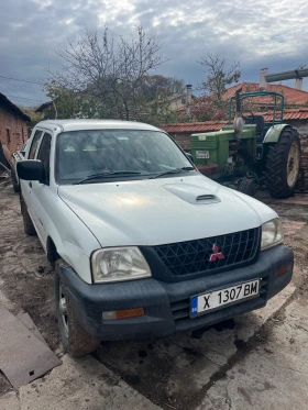 Mitsubishi L200, снимка 1