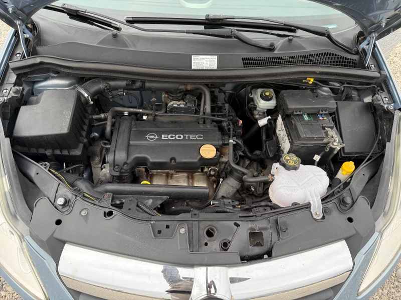 Opel Corsa 1.2i , снимка 11 - Автомобили и джипове - 50008373