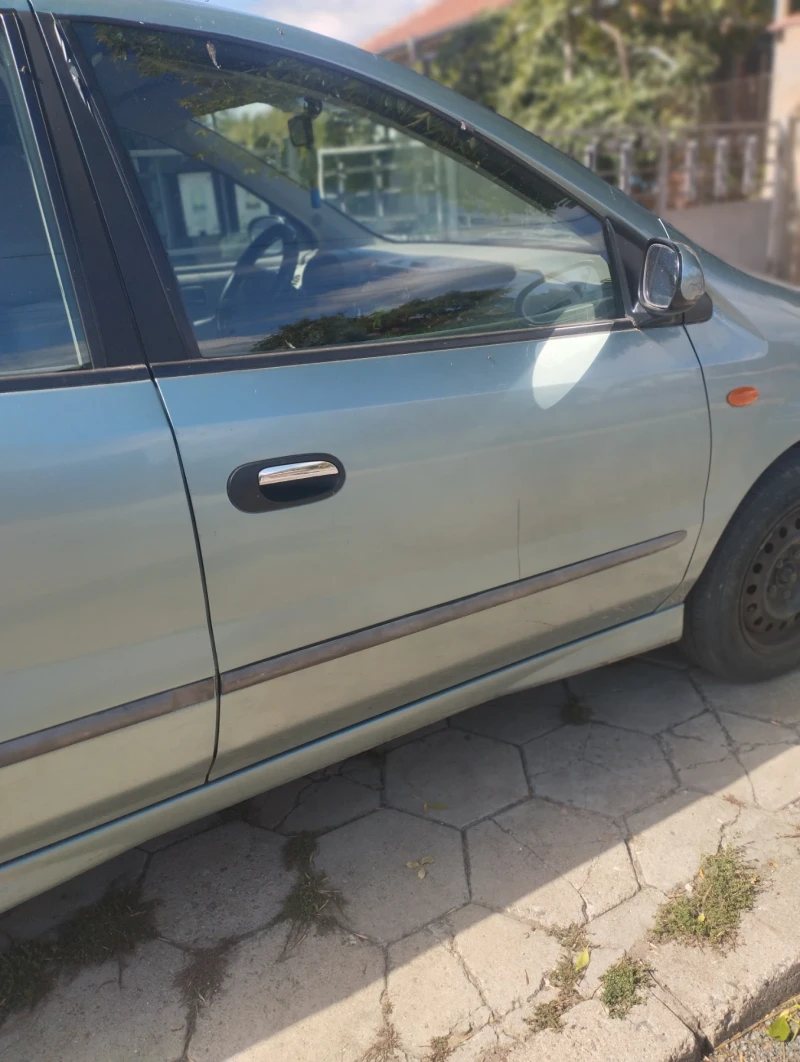 Nissan Almera tino, снимка 3 - Автомобили и джипове - 47494033