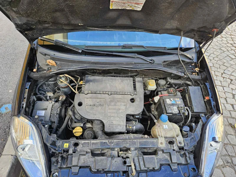 Fiat Punto  1.3 Multijet, снимка 7 - Автомобили и джипове - 53037409