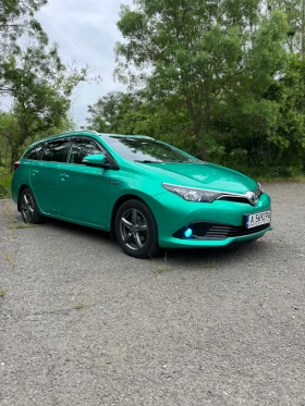 Обява за продажба на Toyota Auris TOURING SPORTS 1.8 HYBRID ~23 500 лв. - изображение 1