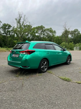 Обява за продажба на Toyota Auris TOURING SPORTS 1.8 HYBRID ~23 500 лв. - изображение 2