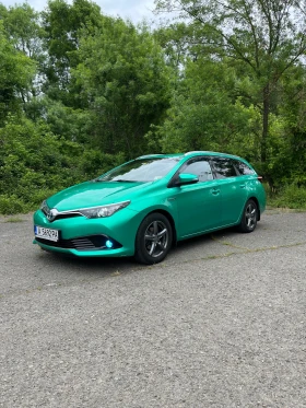 Обява за продажба на Toyota Auris TOURING SPORTS 1.8 HYBRID ~23 500 лв. - изображение 1